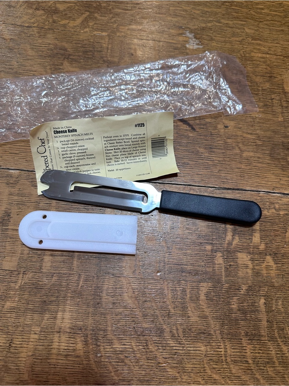 The Pampered Chef NEW Black Handled Cheese Knife with White Sheath